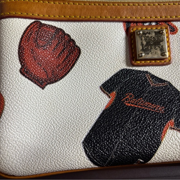 Dooney & Bourke Sports-Themed Wristlet with Black and Brown Accents - Picture 4 of 8